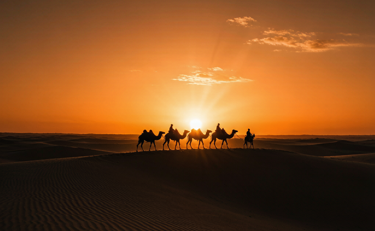 Crescent Lake surrounded by golden Mingsha sand dunes in Dunhuang