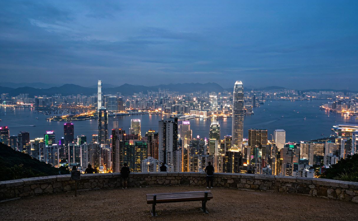 The red Peak Tram climbing the steep rail track toward Victoria Peak Hong Kong