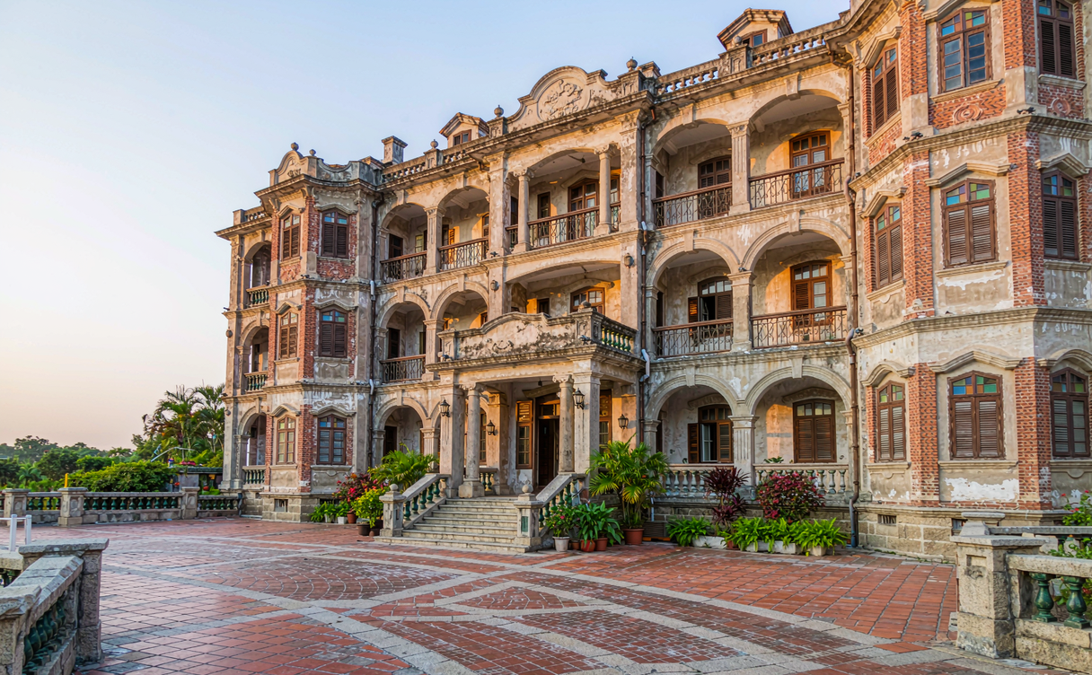Seaside hotel balcony in Xiamen with views of Gulangyu Island and the coast