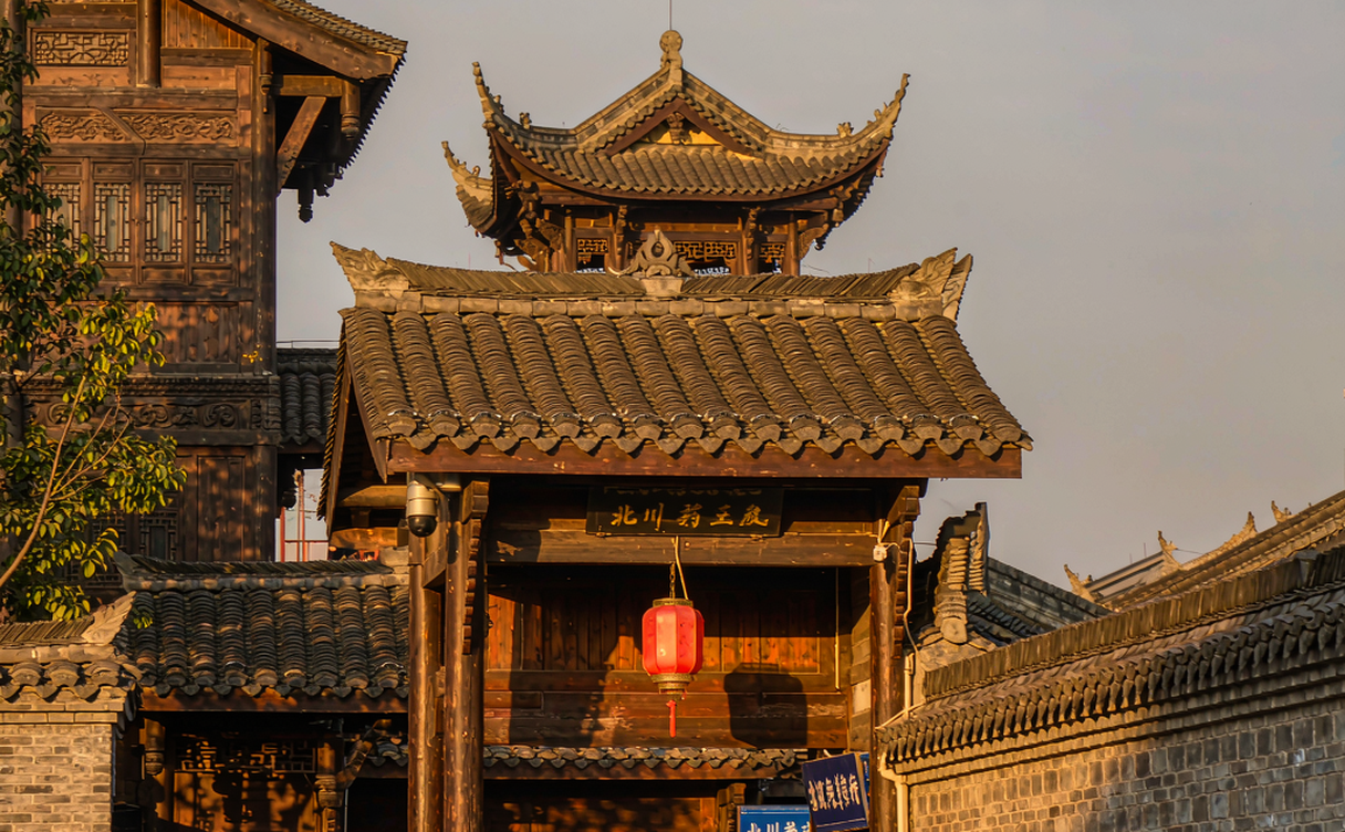 A traditional Bozhou pharmacy with carved wooden cabinets and old apothecary architecture