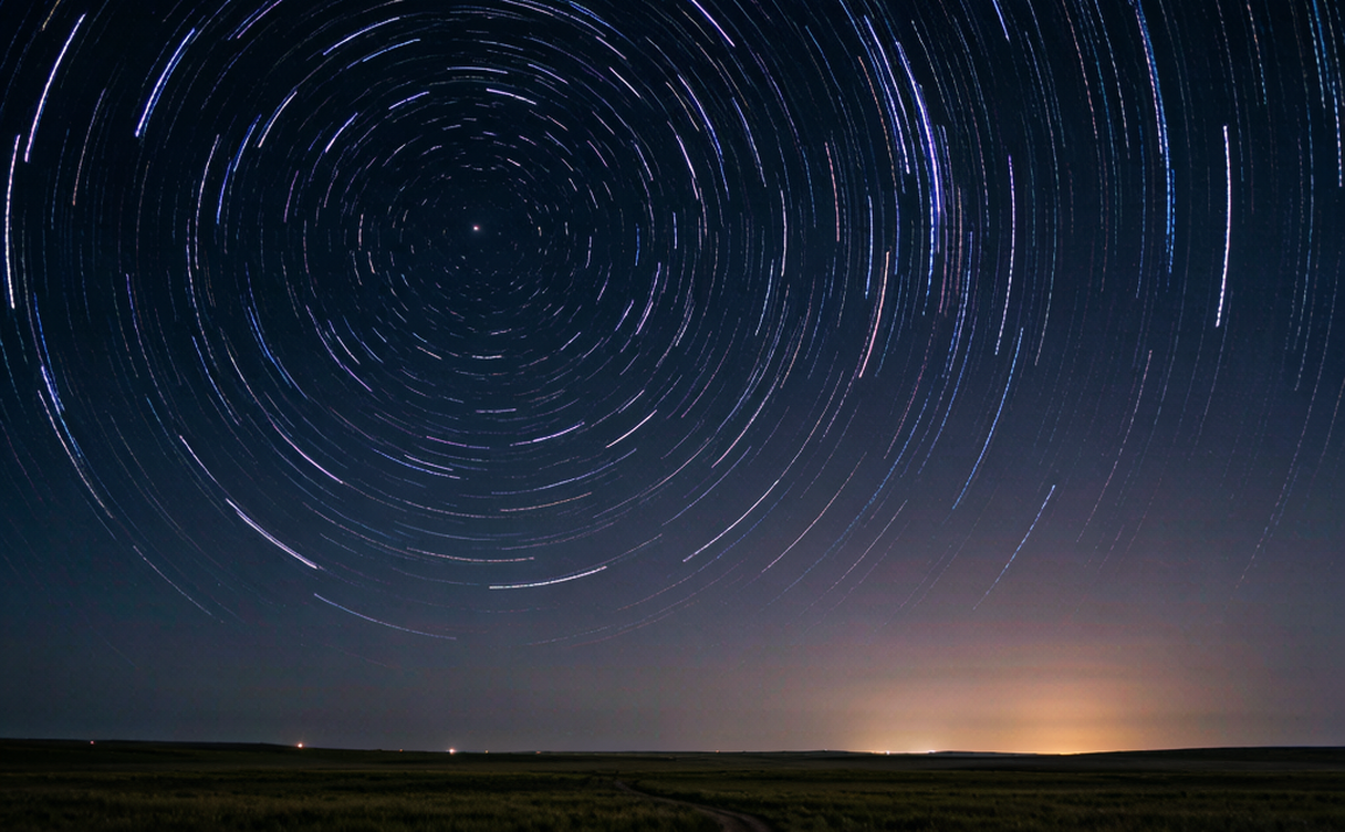 Chaka Salt Lake in Qinghai China at night with Milky Way reflected on the salt flat