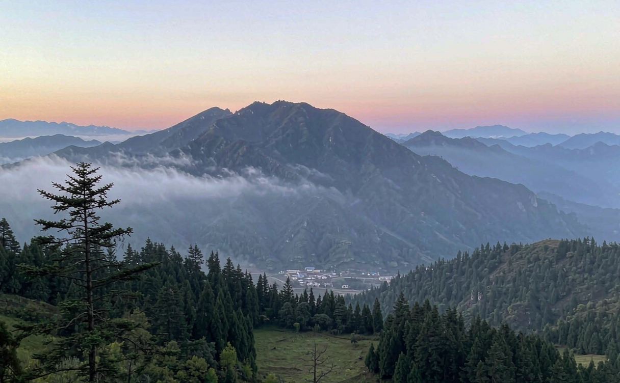Drone launched over a Chinese landscape at dusk