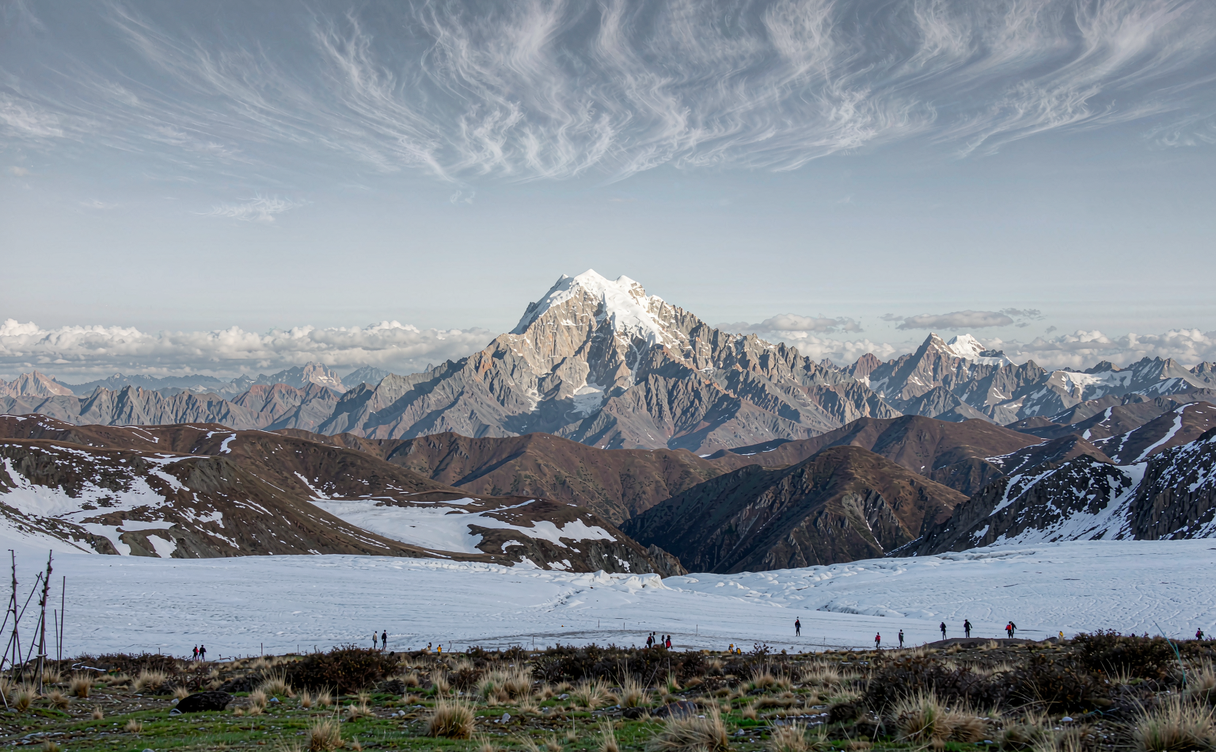 Snow covered Mount Gongga peak at sunrise seen from Zimei Pass