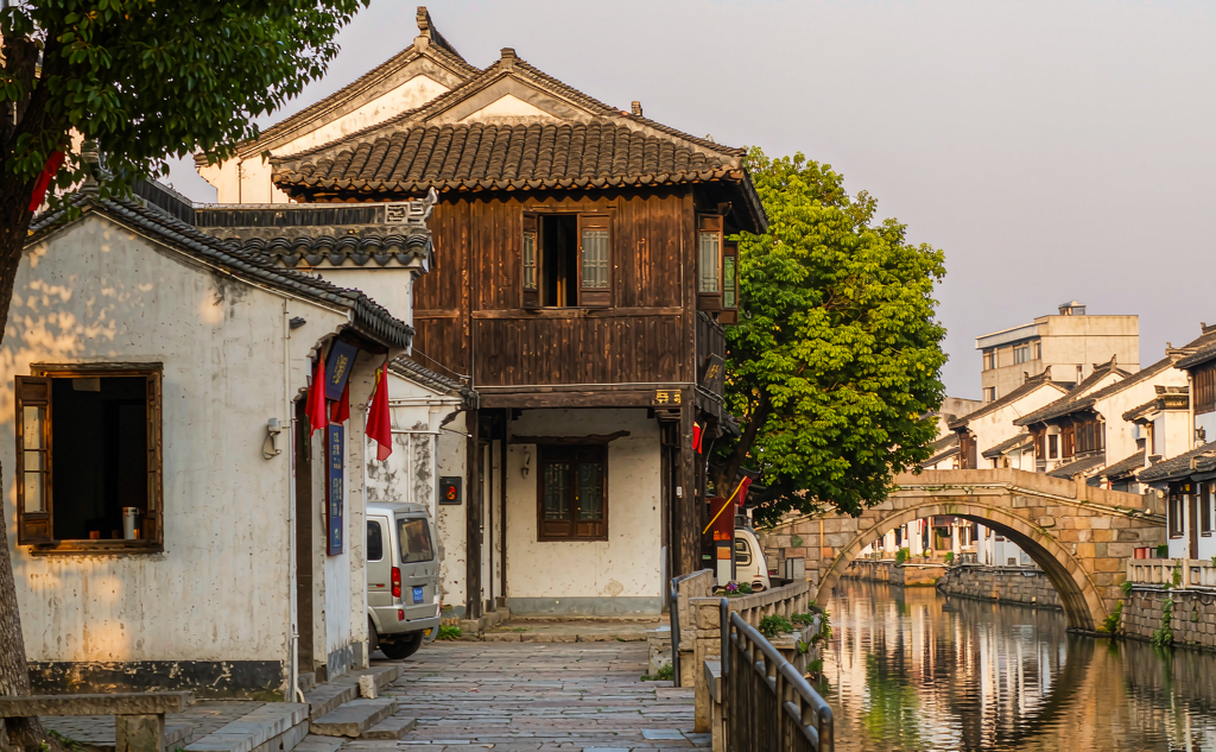 Ma'anshan riverside old town with narrow lanes, tiled roofs, and hanging lanterns