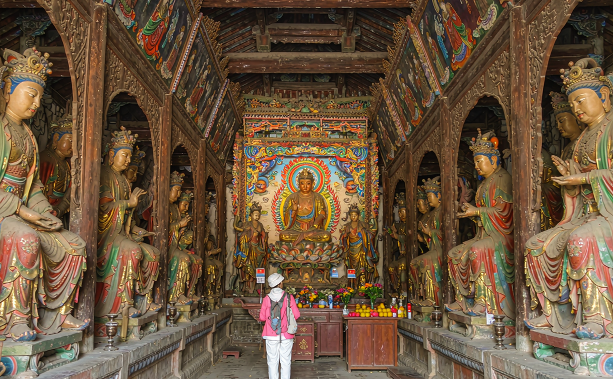 Interior of the Arhat Hall at Guiyuan Temple Wuhan with hundreds of gold painted clay arhat statues on tiered shelves