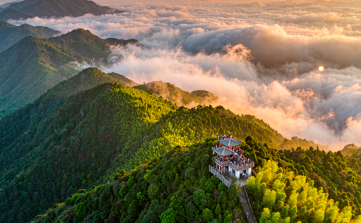 Outdoor hot spring pools steaming among bamboo at dusk in Xianning