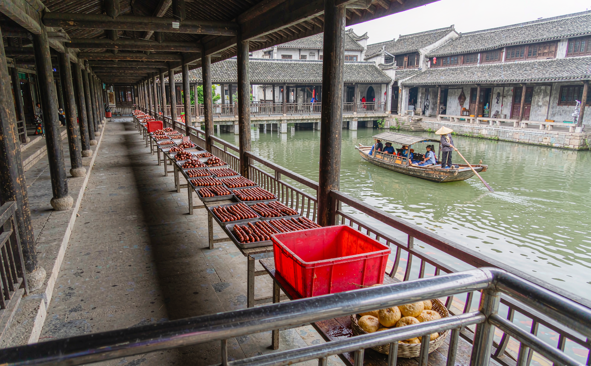 Cured sausages hanging under the riverside arcade in Anchang ancient town, Shaoxing, Zhejiang, China