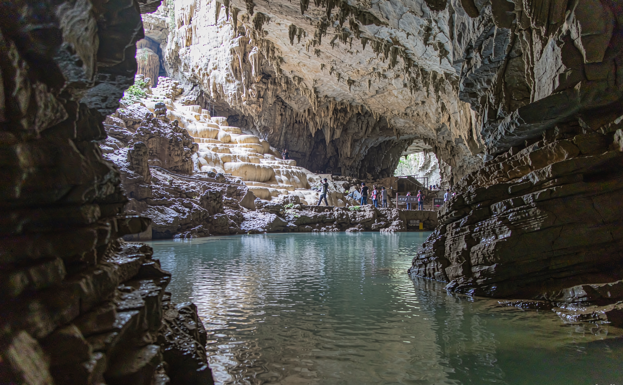 Electric boat on the underground river inside Benxi Water Cave in Liaoning, China