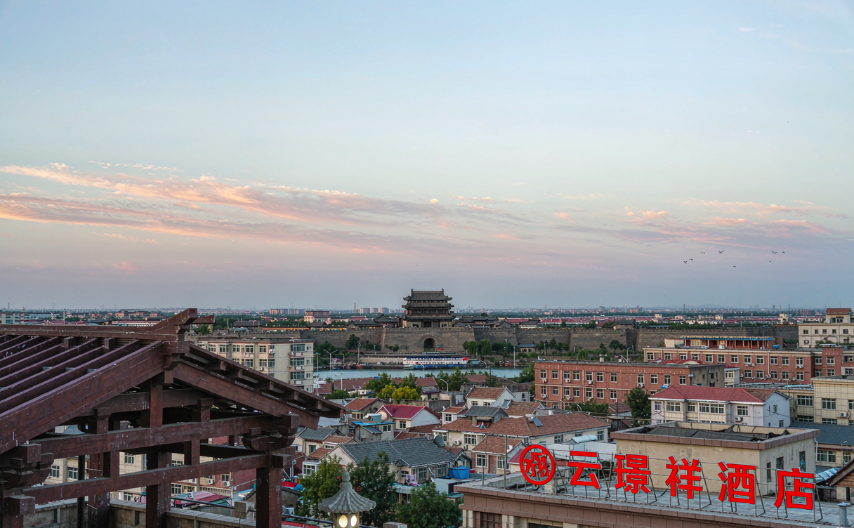 Hotel rooftop view of the restored Datong city wall and watchtower at dawn