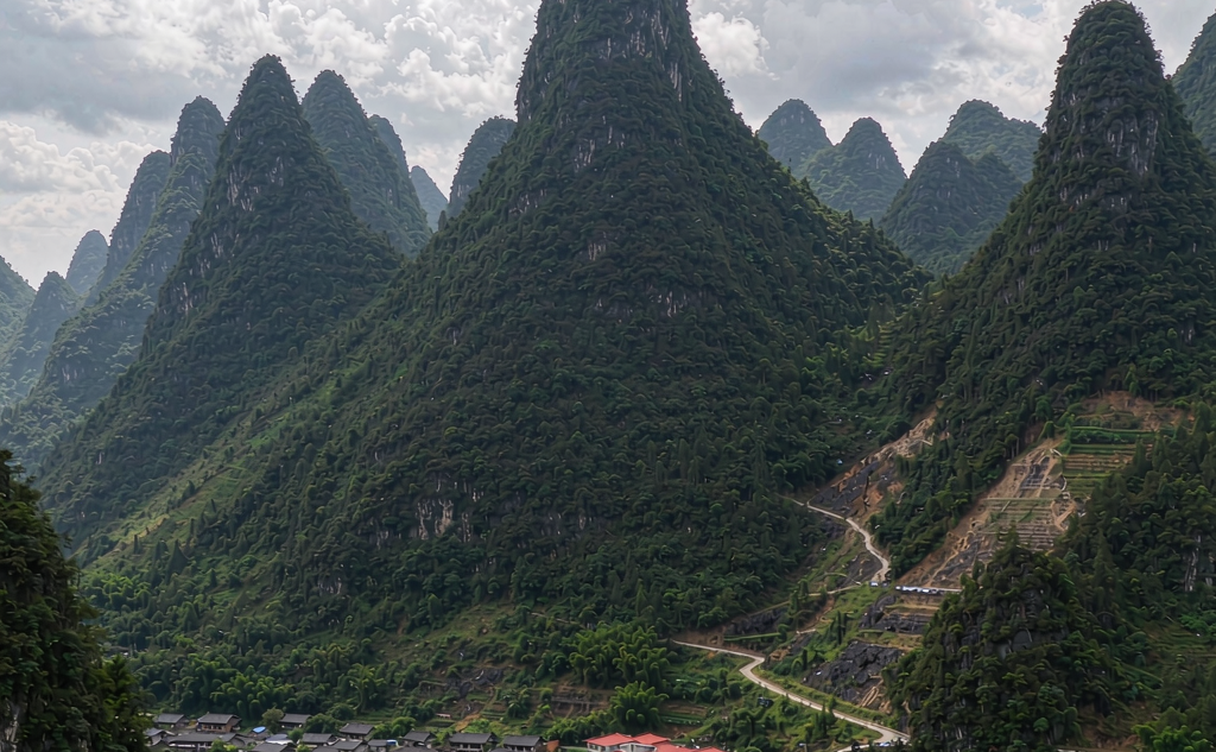 Crenellated Great Wall winding over forested mountains at Mutianyu