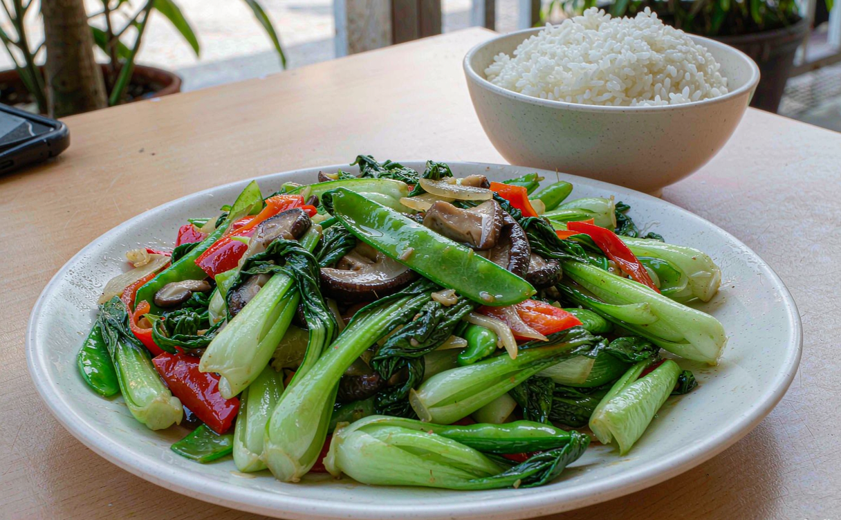 Hot pot with vegetable and beef plates for a gluten-free meal