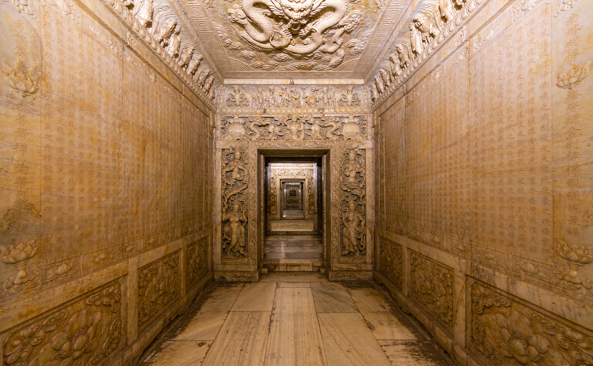 Painted beams and gilded phoenix carvings inside the Cixi tomb hall at the Eastern Qing Tombs