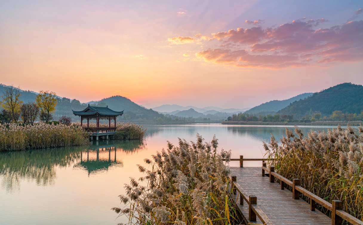 Fairy Lake wooden pier and boat at dawn