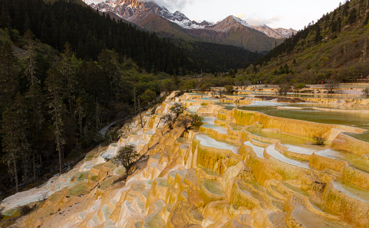 Huanglong golden travertine terraces with water