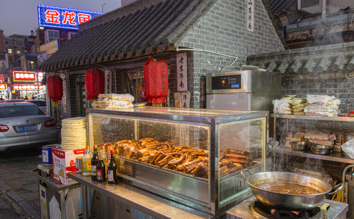 Jinan street food counter with braised pork baobing rice sets
