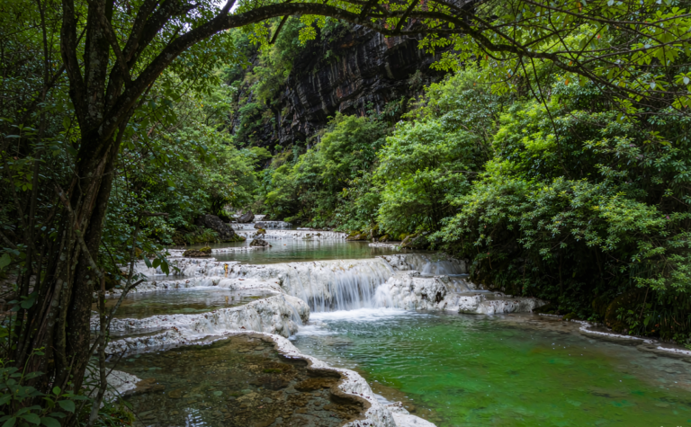 Munigou, Sichuan: Twin Lakes and Travertine Cascades Near Huanglong