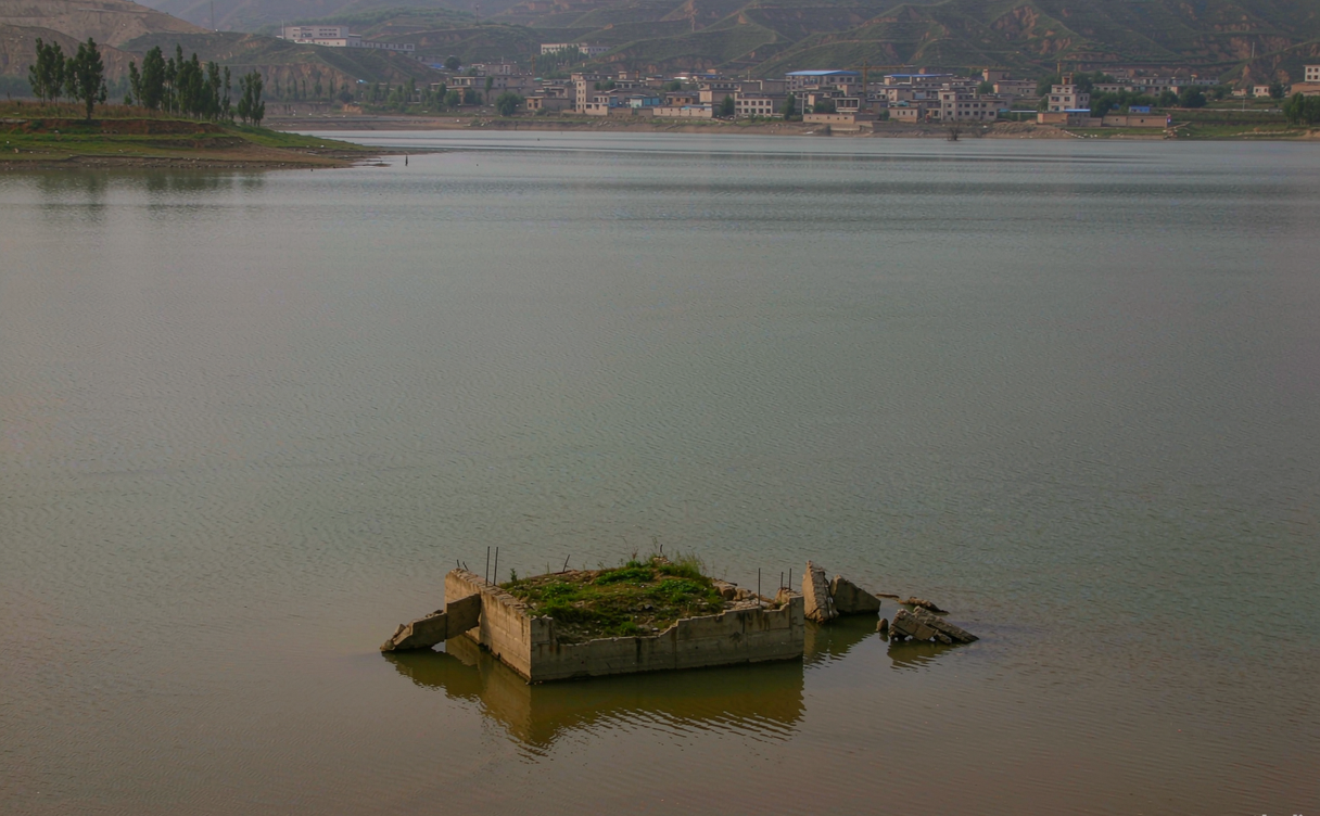 Fragmented Great Wall ruins half-drowned along the Panjiakou lakeshore