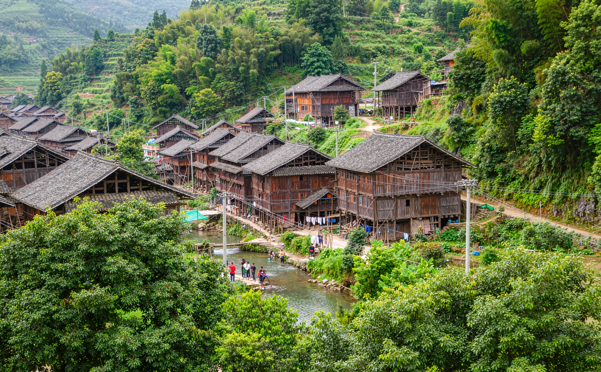 Shui minority stilt-house village in Sandu Guizhou during autumn harvest