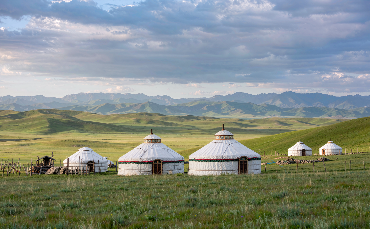 Sangke Grassland yaks and prayer flags in Gansu, China