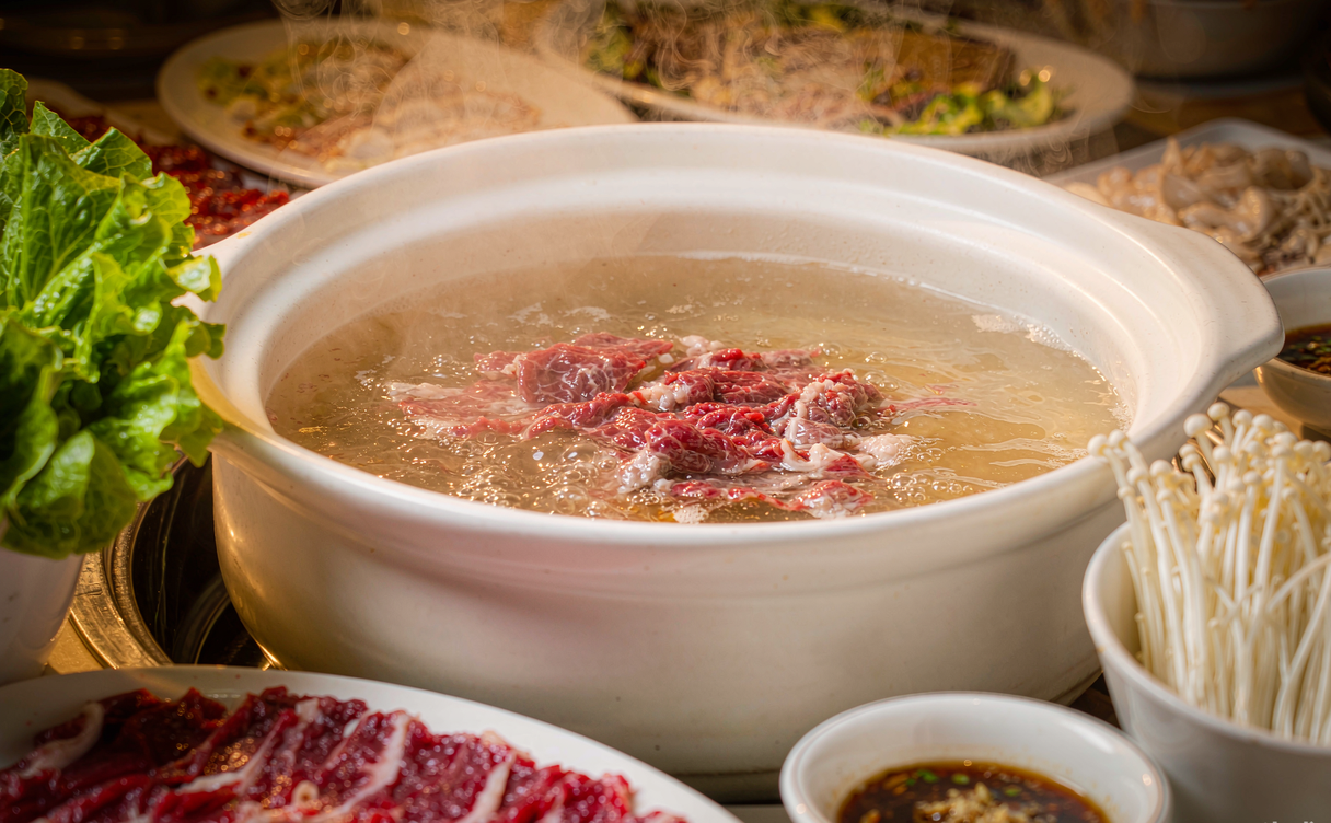 Shantou beef hotpot with thin slices of beef in a clear broth
