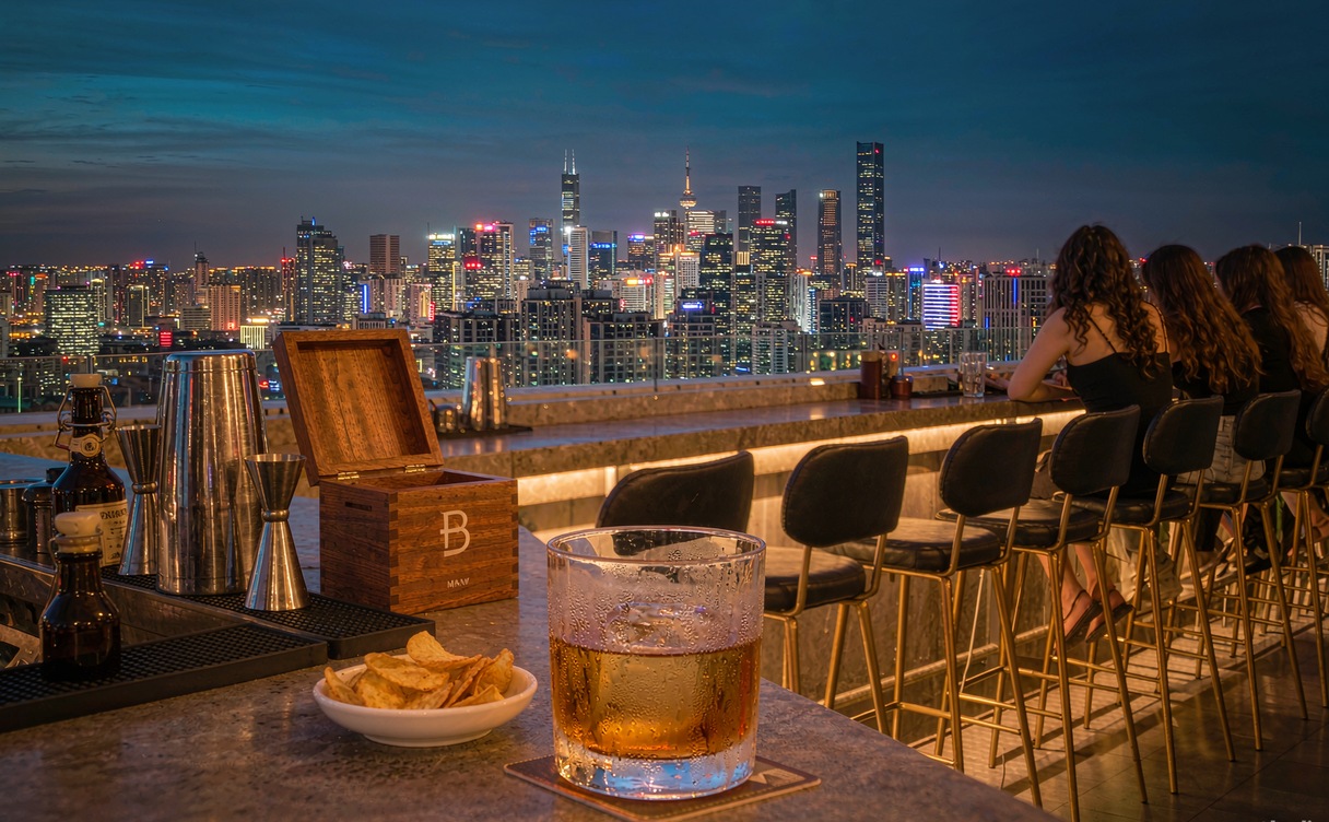 Shenzhen rooftop bars guide - cocktails on a rooftop bar counter at sunset