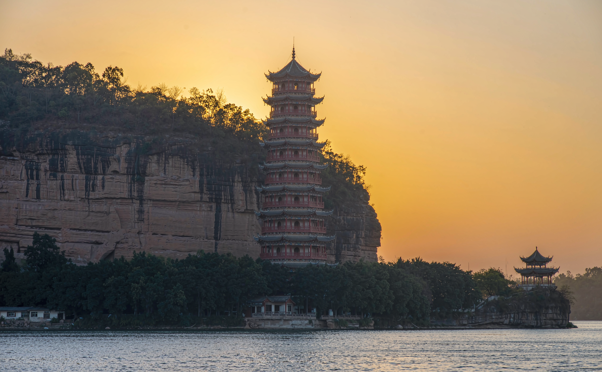 Interior wooden staircase and small shrine inside the Shibaozhai cliff tower