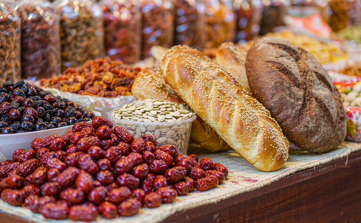 Tacheng Xinjiang food market with dried fruit and Russian bread in Xinjiang, China