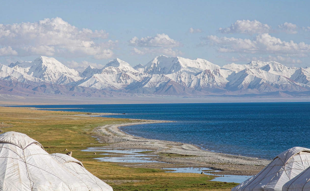 Karakul Lake reflecting the snow peak of Muztagh Ata on the Pamir Plateau near Tashkurgan, Xinjiang, China