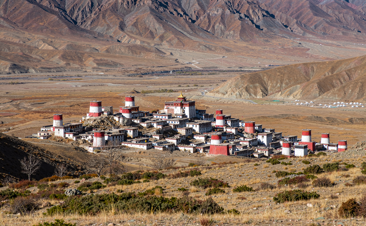 Tholing Monastery stupas at sunset in Tibet, China
