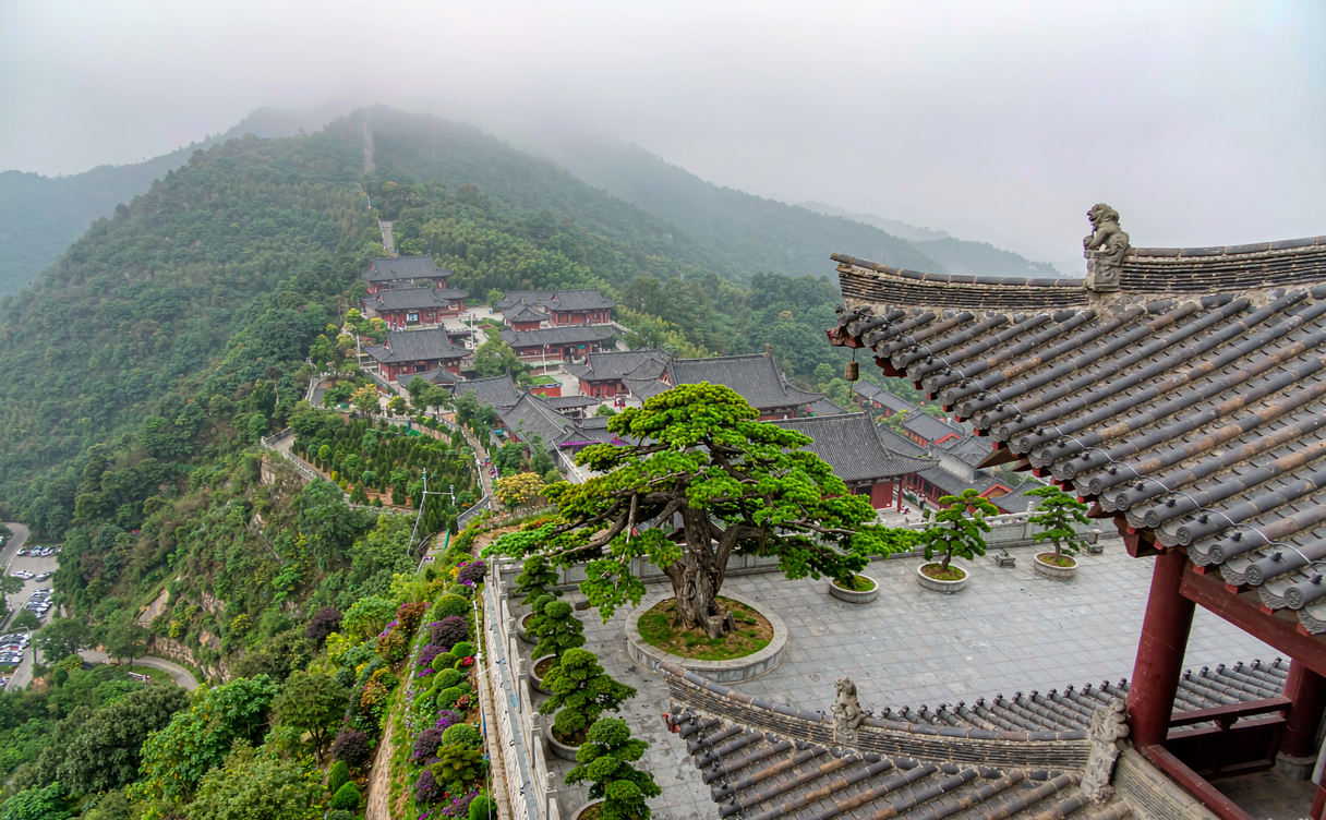Forested waterfall stairs of Feiliu Qianchi on Xiqiao Mountain Guangdong after rain