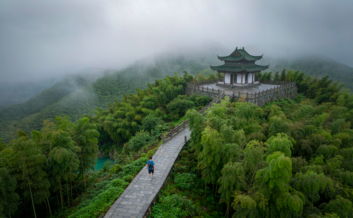 Bamboo path leading up to a hillside pavilion on Xuedou Mountain in Ningbo