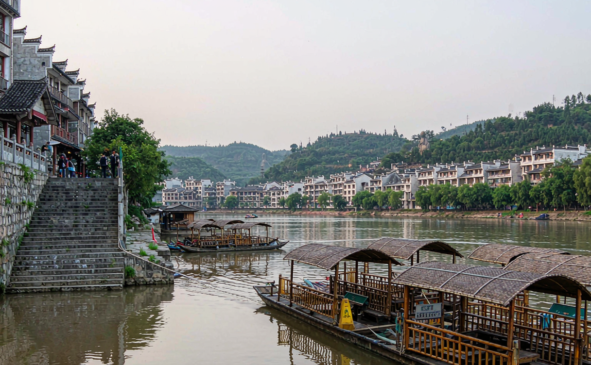 Narrow stone-paved old street in Daxu ancient town flanked by wooden shops