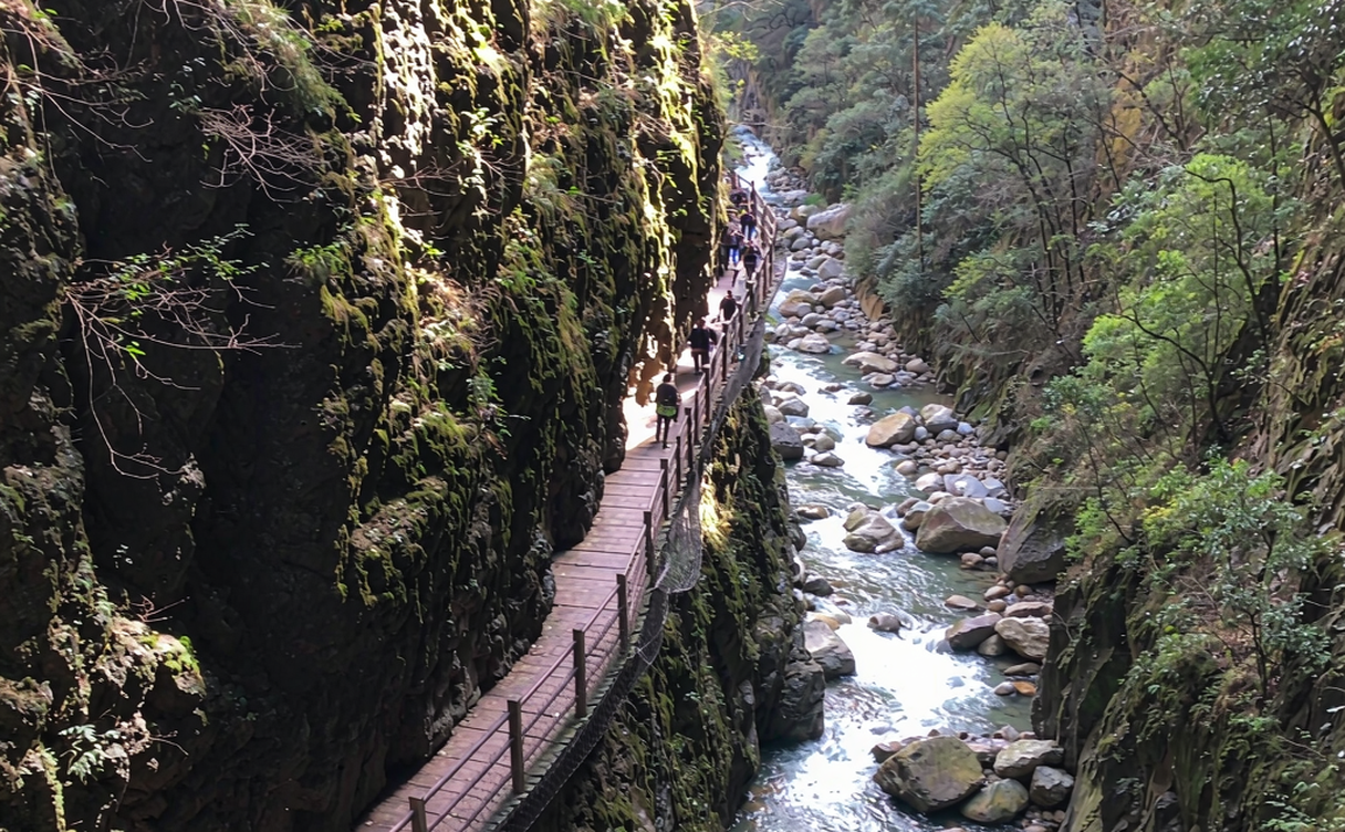 Red stone forest canyon at Mati Temple grottoes under an autumn sky