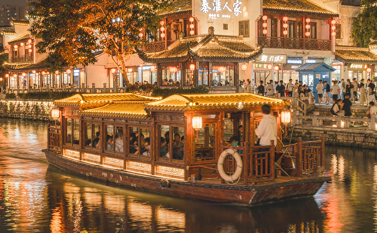 Nanjing Confucius Temple lit by red lanterns along the Qinhuai River at night