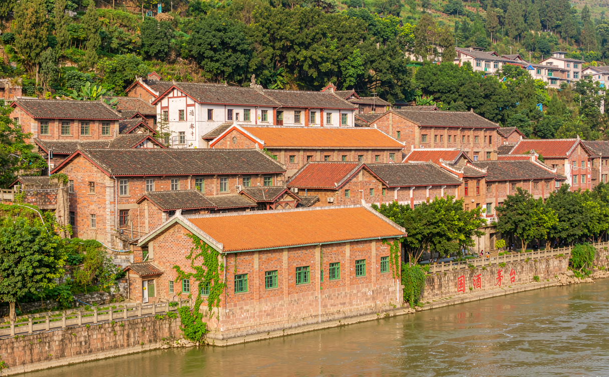 Stacked traditional Maotai distillery courtyards along the Chishui River in Renhuai, Guizhou, China