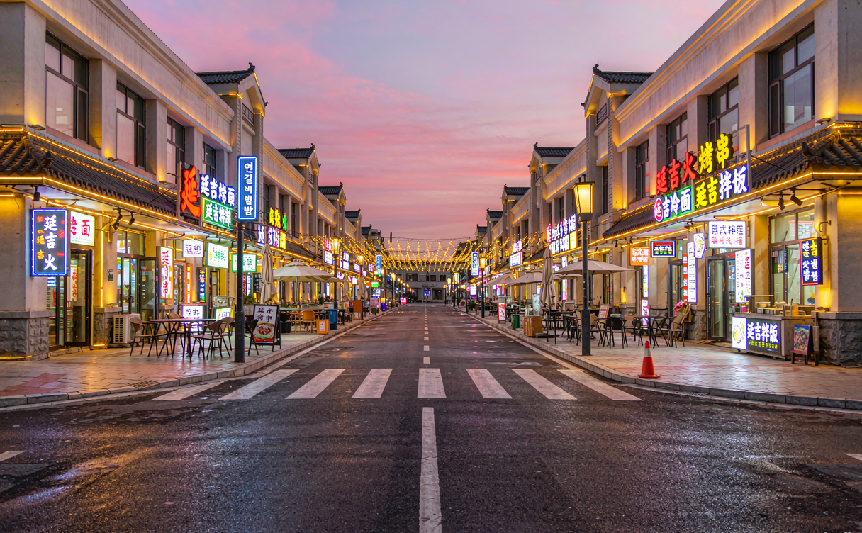 Neon food street in Yanji with Korean signage